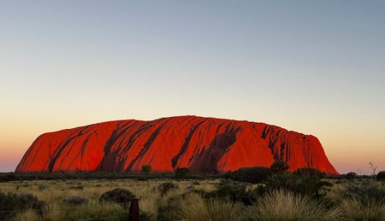 Photo of Uluru at sunset