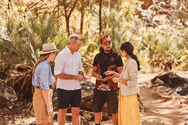Group of people exploring bushtucker with a local guide