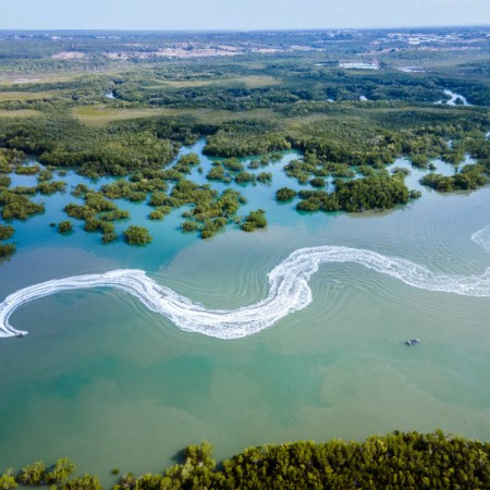 Ariel view of jet skis on waterway 
