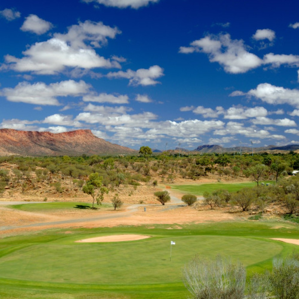 View of Alice Springs Golf Course with backdrop of the desert