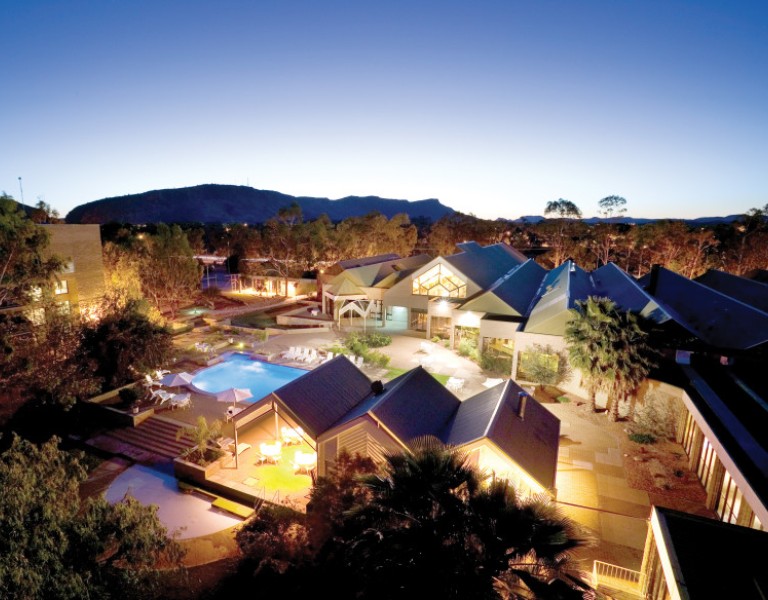 Ariel view of hotel at dusk