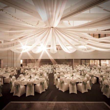 Function room with set dining tables at DoubleTree Hilton Darwin