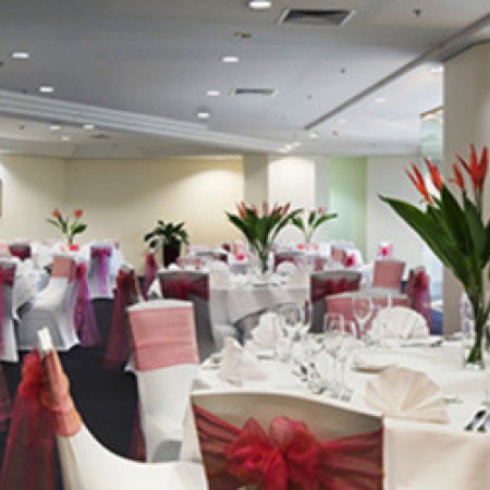 Indoor function room with set dining tables
