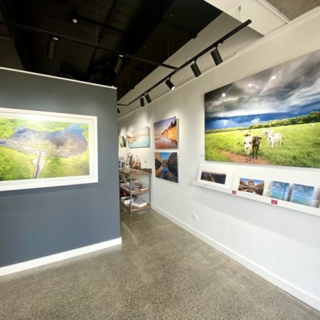 Louise Denton gallery with photography displayed no wall 