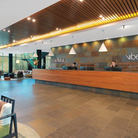 Reception area at Vibe Hotel Darwin Waterfront