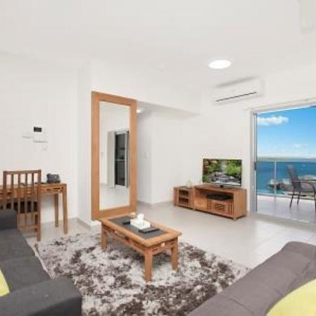 Loungeroom and balcony at Ramada Zen