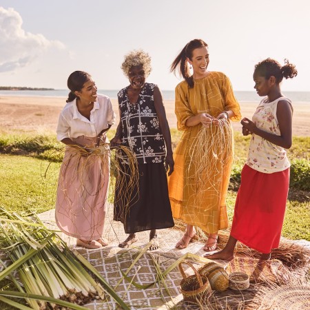 Group of people weaving at Mindil Beach Casino and Resort 